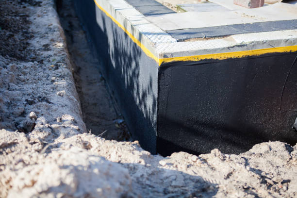 Professional Waterproofing technician working in Toledo, IL